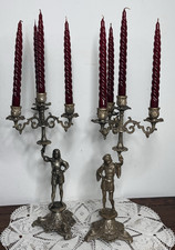 Vecchia coppia di candelabri in ottone a 4 portacandela / candele rosse