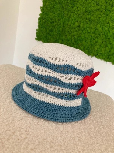 Cappello bimba lavorazione