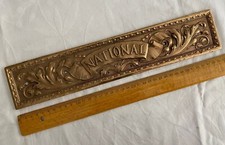 Pannello cassetto ottone