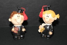 Simpatiche statuine laureate