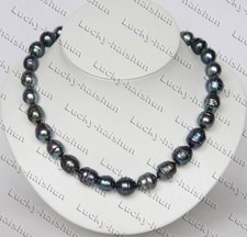 collana filo perle nere pavone