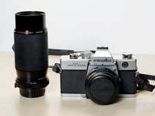 MINOLTA SR-T 100X con obiettivo 45/2 MM- (LEGGERE)