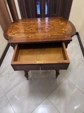 Tavolino da salotto vintage Vendo ovale 39x66, altezza 74.