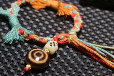 Amuleto appendiabiti magico