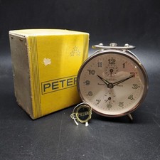 Sveglia tedesca Peter con quadrante rotondo, numeri arabi. Mai usata