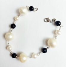 Bracciale in argento 925 con perle bianche 9/10 mm e 4 mm onice sfaccettato 5 mm