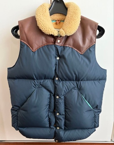 Gilet piumino shearling con