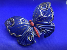 Statua in porcellana farfalla