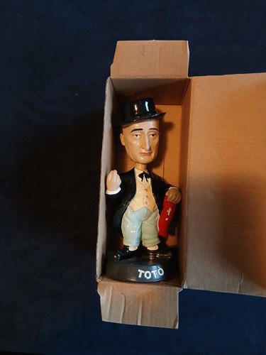 Statuetta toto con testa - di,