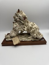 Statuina Giuseppe Armani