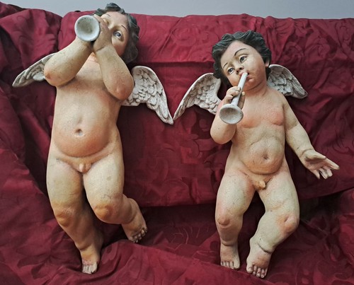 Coppia putti in - di,