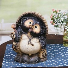 Statua cane procione