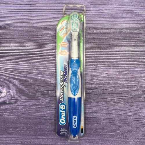 Oral toothbrush cross action - b,