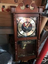 Orologio da parete a pendolo con datario anni '60