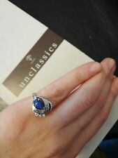 Anello antico da mignolo in oro bianco 14 kt con diamanti e zaffiro stellato.