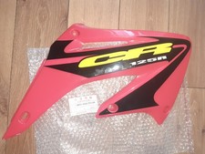 NOS HONDA CR 125 R 2003 OEM COPRICAPO RUOTA DESTRO 19071-KZ4-J50ZA EVO CR125R