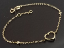 BRACCIALE IN ORO 18 CT. 750 CON CUORE CENTRALE E ZIRCONI