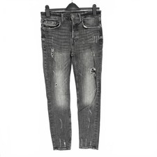 Jeans skinny grigio strappato