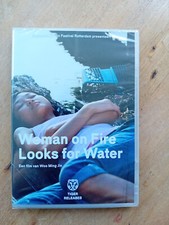 Woman on Fire Looks for Water