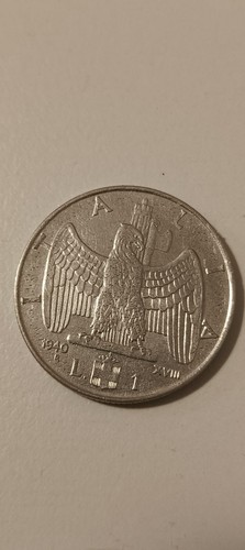 Una monete lira - da,