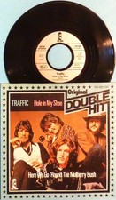 TRAFFIC - SINGLE - HOLE IN MY