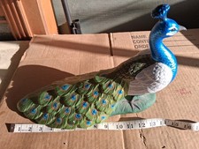 Scultura uccellino pavone re