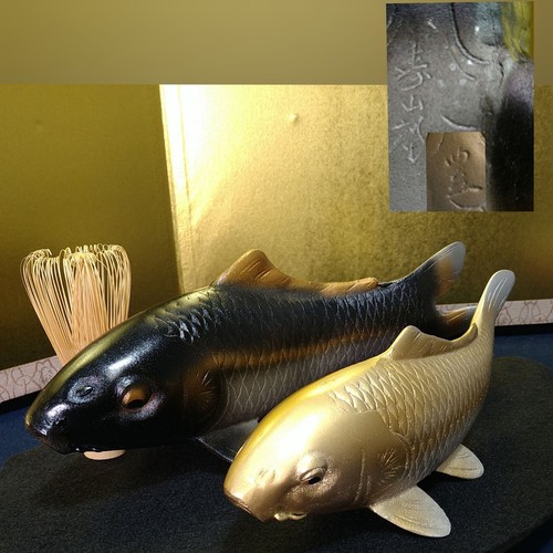Statua pesce koi gemello arte
