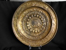 Piatto elemosina in ottone dorato, manifattura fiorentina, XVI secolo