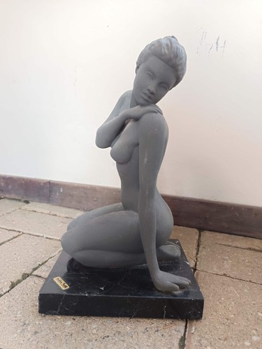 Scultura ceramica dal - in,