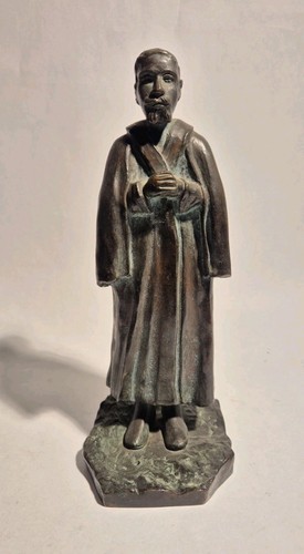 Statua bronzo - in,