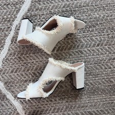 Tacco tutto nero con frange