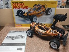 KYOSHO OPTIMA PRO 4WD RACING BUGGY 30620 44000 RTR 2,4 GHZ SET RADIO MOTORE ESC