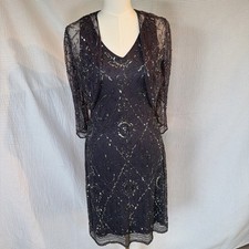 Set abito e giacca bolero