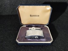 Vintage Ronson Cadet Mini or  Milady lighter with decorative ivy leaf pattern.