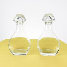 coppia di bottiglie in vetro