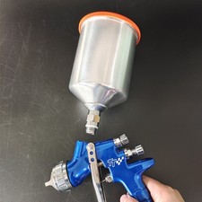 Pistola a spruzzo tazza