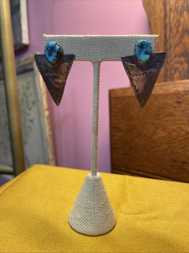 Orecchini triangolari fatti - , a