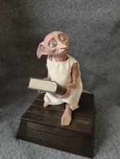 Harry Potter Dobby la casa Elfo che parla salvadanaio in movimento Tomy