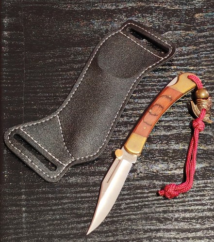 Coltello pieghevole tipo buck - tipo,
