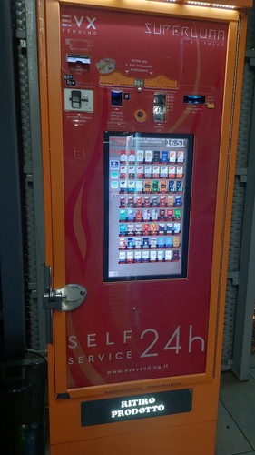 Distributore automatico - , di