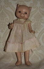 One Composition Pig Doll di