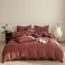 Set piumone rosso mattone