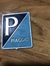 VESPA PIAGGIO  LOGO SCRITTA SCUDETTO FRONTALE ALLUMINIO  -  USATO DELL'EPOCA
