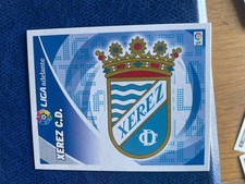 PANINI ESTE LIGA 2012/13 ESCUDO XEREZ   VELINA ORIGINALE NEW