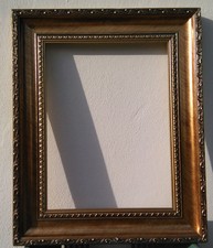 cornice legno/gesso dorata, 