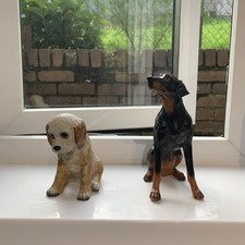 2x ceramic and composite dogs