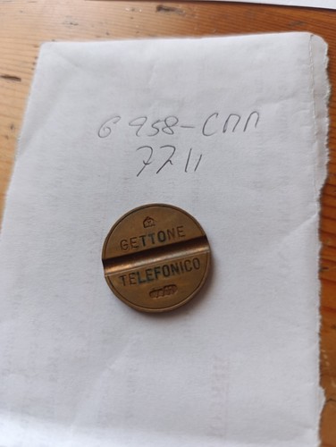 Gettone telefonico 7711 cmm - gettone,