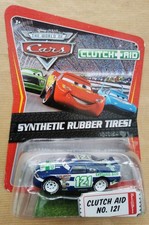 Disney Pixar Cars CLUTCH AID # 121 RUBBER TIRES KMART Nuovo in Blister Mediocre