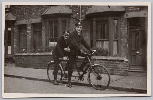 Men uniform riding tandem - riding, a