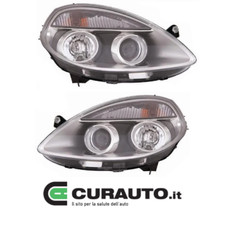 COPPIA FARI PROIETTORI FANALI ANT Sx E DX LENTICOLA LANCIA YPSILON MUSA 09/2011>